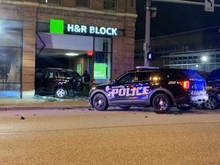 SUV crashes into H & R Block, Davenport