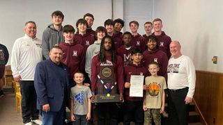 Rock Island County Board honors Moline boys basketball