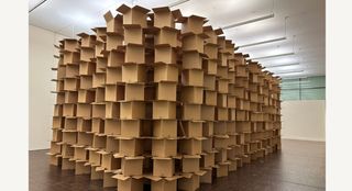 Are moving stacks of cardboard boxes art?