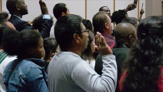 91 new American citizens naturalized at Augustana College