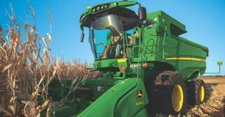 Deere Q1 income down from last year