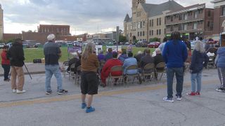  Quad City community members gather to pay respects to victims and survivors of building collapse