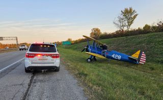 Biplane makes emergency landing near Iowa highway