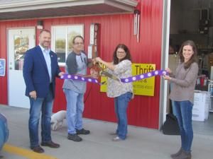 Ribbon cut on thrift store in Muscatine