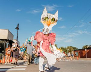 Artist brings larger-than-life puppets to small towns