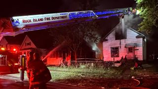 Firefighters battle 2 early morning house fires