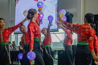 50 years after their families came to Iowa, these Tai Dam dancers carry on cultural traditions with every step