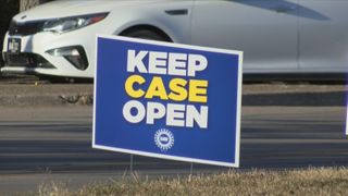 Workers rally against CNH Burlington closure