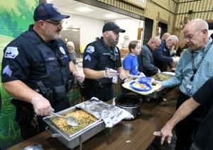 For 37 years, Davenport police have served up Thanksgiving dinner for Empowering Abilities