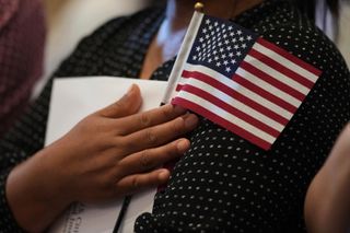 QCA naturalization ceremony welcomes 60 new US citizens