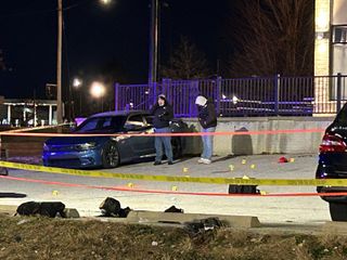 2 dead, 1 wounded after gunfire in parking lot of bar in Davenport
