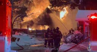 Crews battle house fire in Rock Island