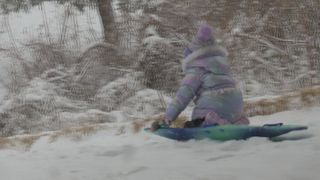  QC residents find fun in weekend snow storm