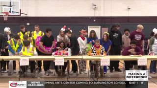  Moline High School students raise funds through donut eating contest