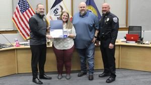 Muscatine awards Medal of Merit to civilian for her actions following June Hy-Vee shooting