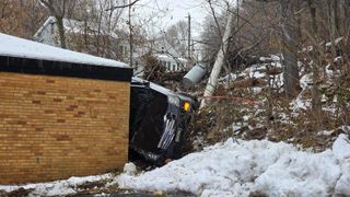 Davenport crash knocks down power pole