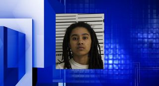 Davenport woman arrested, charged in drive-by shooting