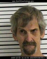 Davenport man accused of threatening children with a crossbow