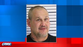  Police: Davenport man charged after entering apartment building with hatchet