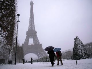 Snow and ice ground flights and choke highways in parts of Europe