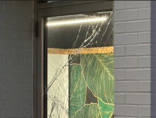 Crash takes out door in downtown Davenport