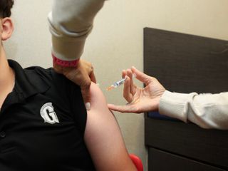 Flu shot recommendation for kids dropped just as the illness rages