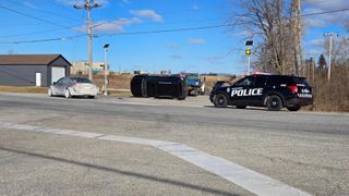 SUV on its side after Davenport crash