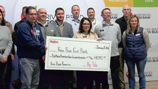 Hy-Vee presents River Bend Food Bank with check for more than $18,000