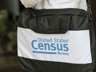 A major census test faces cutbacks — with postal workers tapped to help count