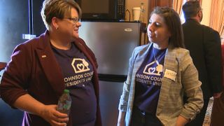  How people in purple shirts demanded changes for mobile home residents