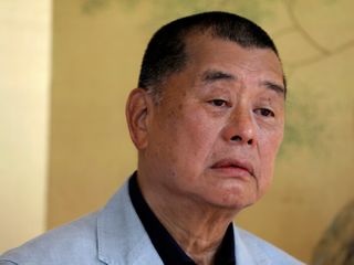 China critic and former media tycoon Jimmy Lai is sentenced to 20 years in a Hong Kong security case