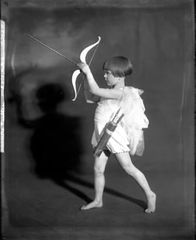 Memories of Muscatine: A young Cupid from "The Masquerade Ball"