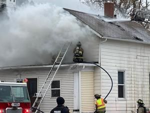 Multiple fire departments respond to house fire in Moline Friday morning
