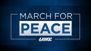  People walk across Centennial Bridge in March for Peace