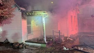 Firefighter injured during Moline garage, house fire