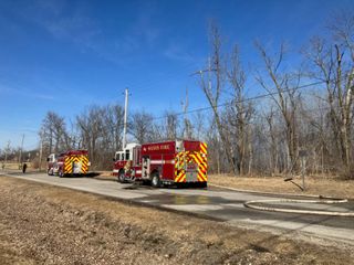 Multiple crews battle Carbon Cliff fire