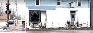 Vehicle hits Davenport building