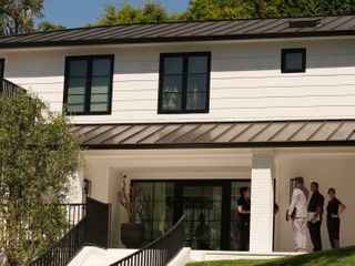 Prosecutor says Rihanna, family were home when woman charged with attempted murder fired