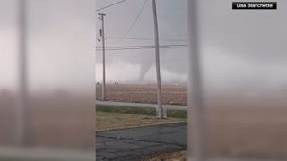  2 killed and homes damaged after tornadoes tear through Illinois and Indiana, more storms moving in 