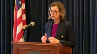 Gov. Kim Reynolds signs ban on local civil rights ordinances