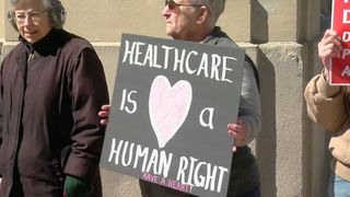 QCA demonstrators protest Miller-Meeks' approach to health care