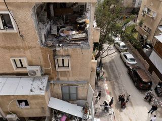 Israel and Iran ramp up attacks as Trump insists Tehran wants a deal