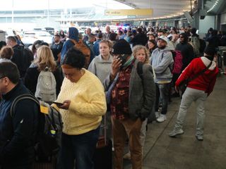 Stuck in a long TSA line? Here are some strategies if you need to rebook your flight
