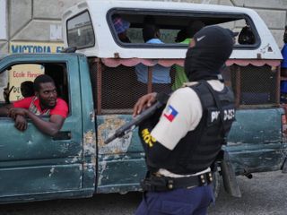 Central Haitian town descends into fire and bloodshed from gang warfare