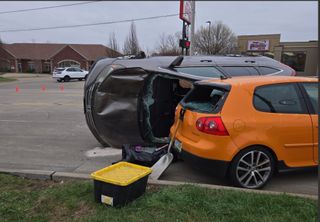 Ambulances on scene after Bettendorf crash leaves car on its side