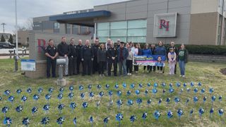 Pinwheel garden planted in Rock Island for Child Abuse Prevention Month