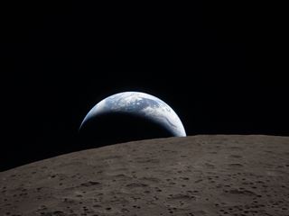 Photos: NASA releases first images from moon flyby