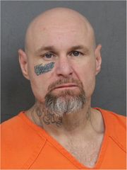 One person arrested, two on the lam in Rock Island armed robbery