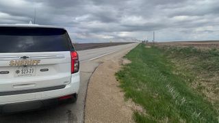  1 dead after vehicle crashes into home, starts fire