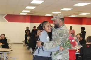 After nine months away from home, Rock Island soldier reunites with his daughter